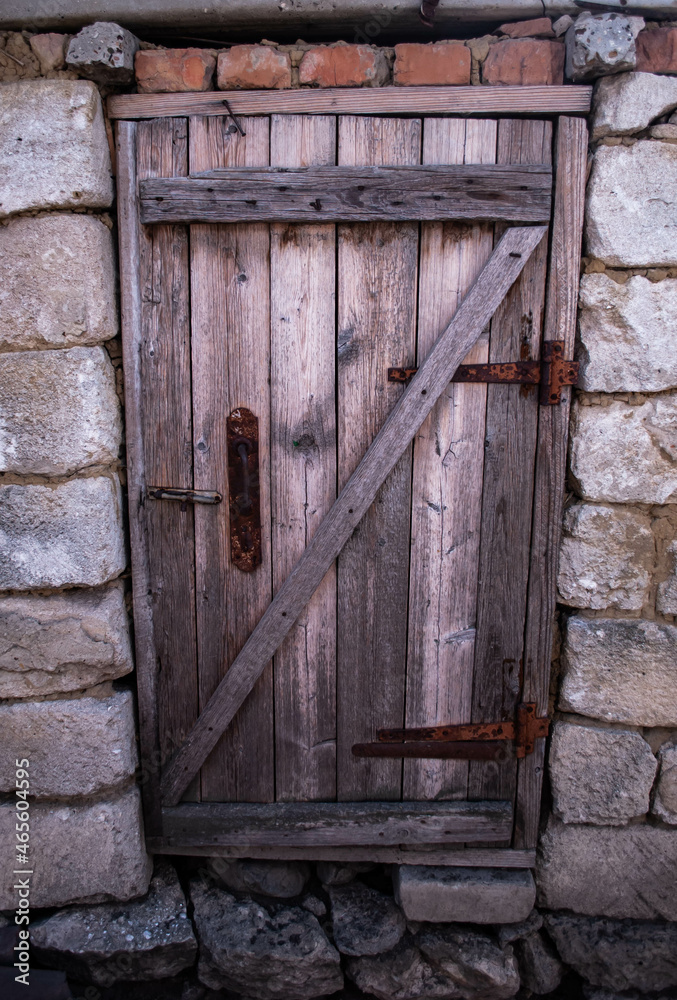 old wooden door with shutters