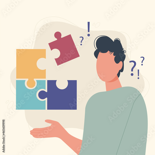 Man trying to put together the pieces of jigsaw puzzles. Question and exclamation marks are hanging in the air. Problem solving and business solution concept. Strategy and success.