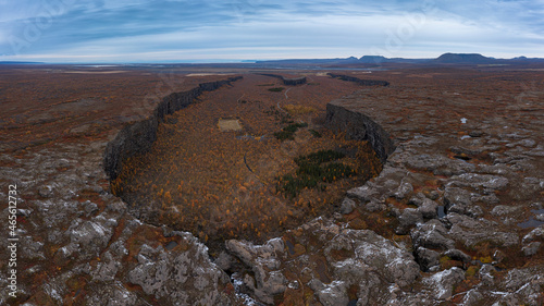 Asbyrgi horseshoe-shaped canyon in autumn aerial view, Iceland. 16:9 panorama