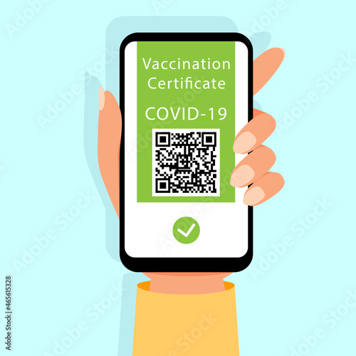 Immunization certificate with qr code on device screen. Smartphone in hand with health passport.