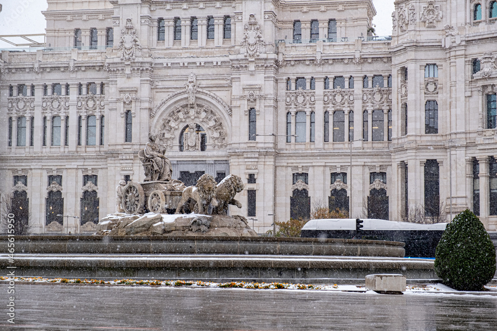 The Cibeles fountain in Madrid on a snowy day