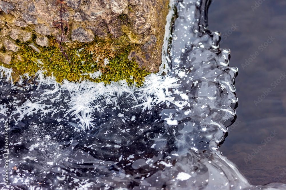 Fast river with ice and snow in late autumn Fast river with ice and snow in late autumn