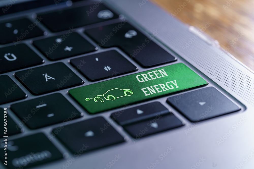 Tastatur mit Taste GREEN ENERGY und Symbol von einem Elektroauto Tastatur mit Taste GREEN ENERGY und Symbol von einem Elektroauto
