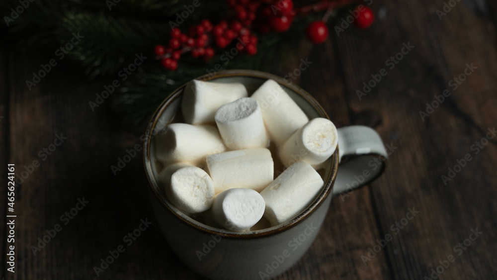 coffee with marshmallows in a cup on the background of a Christmas decor , the concept of Christmas coffee with marshmallows in a cup on the background of a Christmas decor , the concept of Christmas