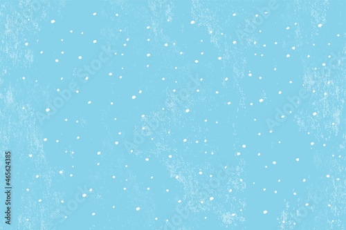 Winter snowfall and snowflakes on light blue background. Hand drawn snow pattern. Doodle cold winter sky background.