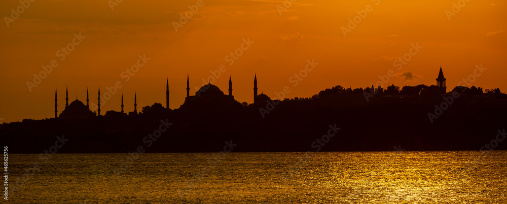 Fototapeta premium Sunset in the Maiden Tower ,Panaromic photo, great colors in istanbul , Uskudar-Salacak- Turkey