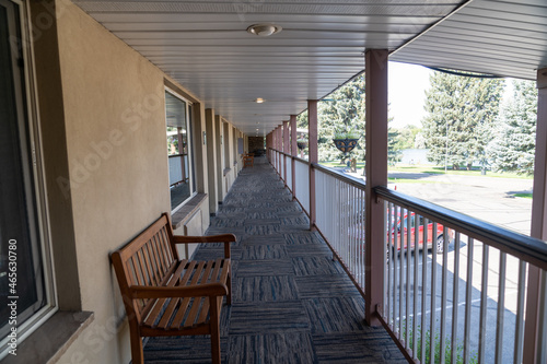 Outdoor exterior corridors of a motel on the second floor
