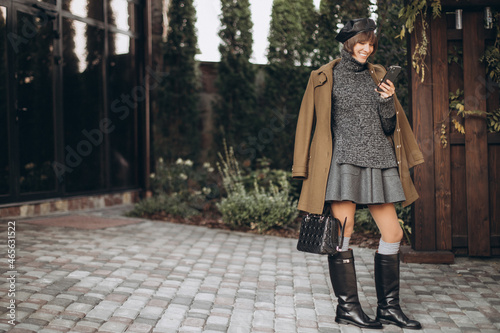 Young woman in an autumn outfit