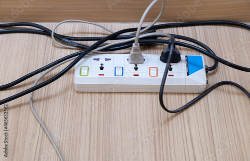 The compact power strip with the electric plug of the electrical appliance.