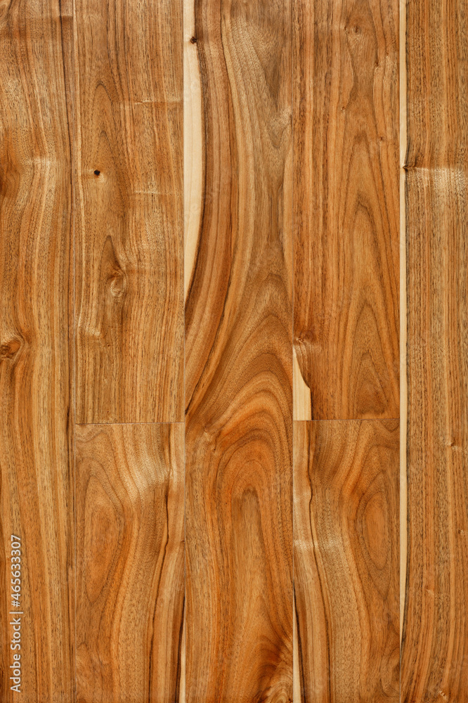 Beautiful texture of natural European walnut parquet boards with vertical grain pattern. Beautiful texture of natural European walnut parquet boards with vertical grain pattern.