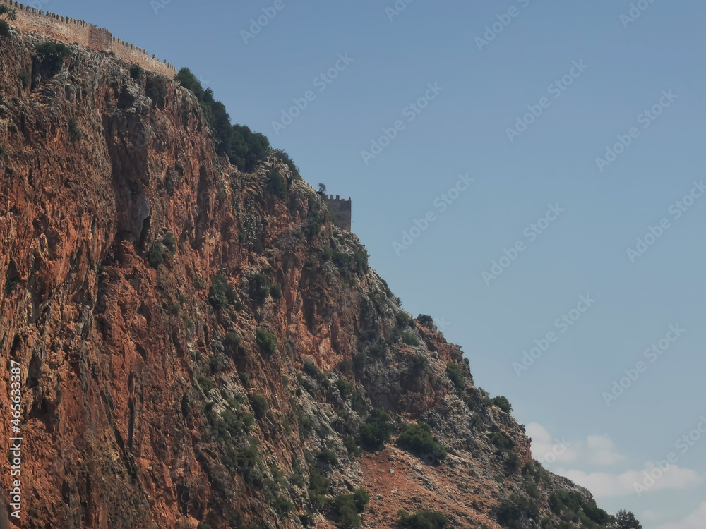 Mountain and part of the fortress wall of the Alanya fortress, Turkey