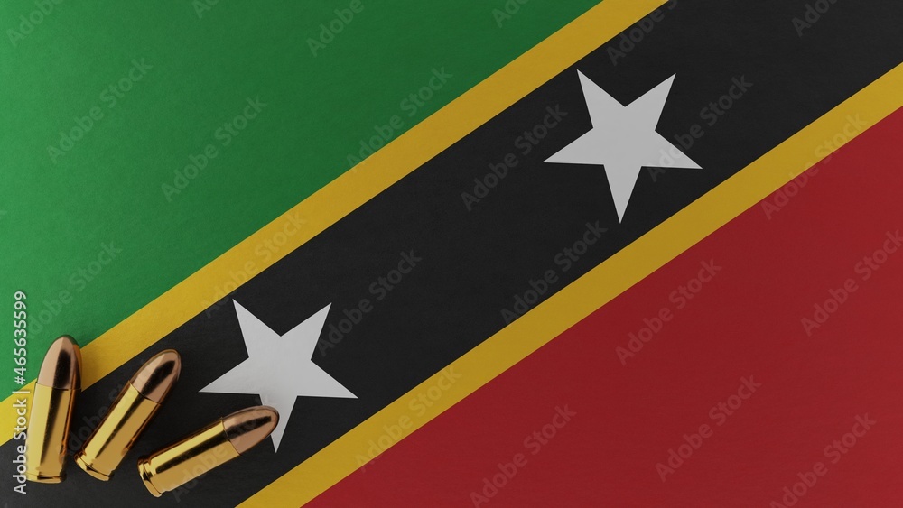 Three 9mm bullets in the bottom left corner on top of the national flag of Saint Kitts and Nevis