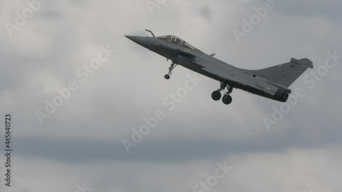 French Rafale fighter jet doing aerobatics photo