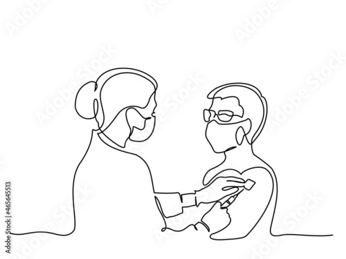 Doctor giving vaccination shot to man woman COVID-19