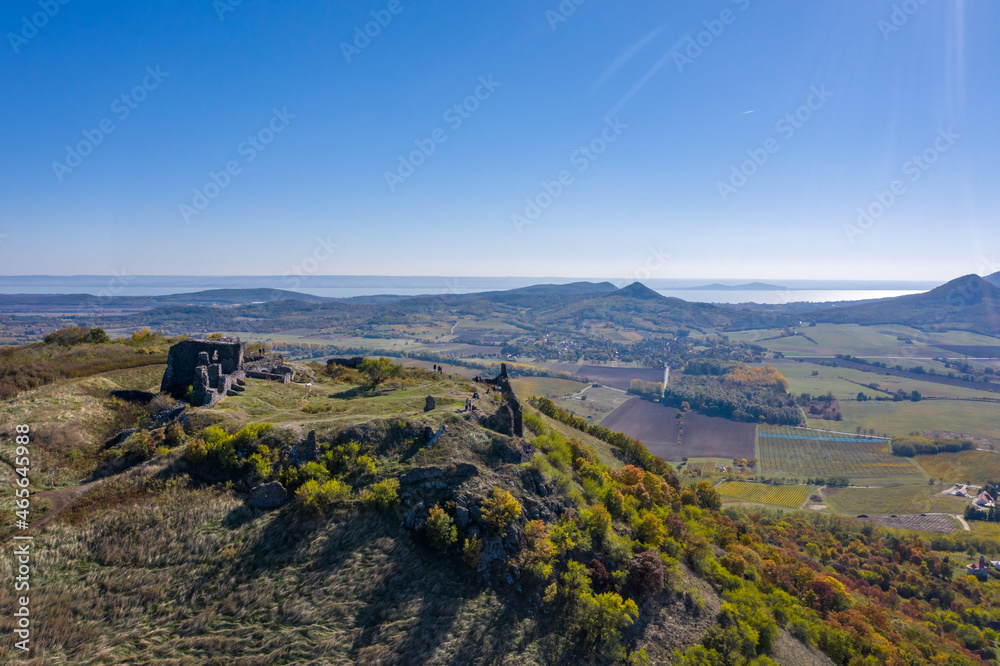 Hungary - Csobánc castle ruins from drone view Hungary - Csobánc castle ruins from drone view