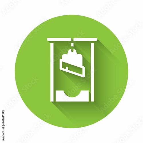 White Guillotine medieval execution icon isolated with long shadow. Green circle button. Vector