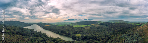 panoramic aerial view Castlewellan forest park during foggy summer morning, Northern Ireland photo