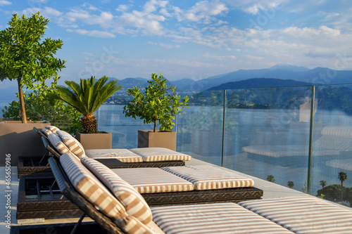 Sun loungers overlooking Lake Maggiore in Italy