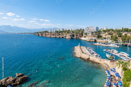 Fototapeta Naklejka Na Ścianę i Meble -   Mermerli beach in Antalya, Turkey, near the old town of Antalya. Antalya is a popular Mediterranean coastal city for tourists.