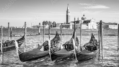 Romantic gondolas moored in Venice