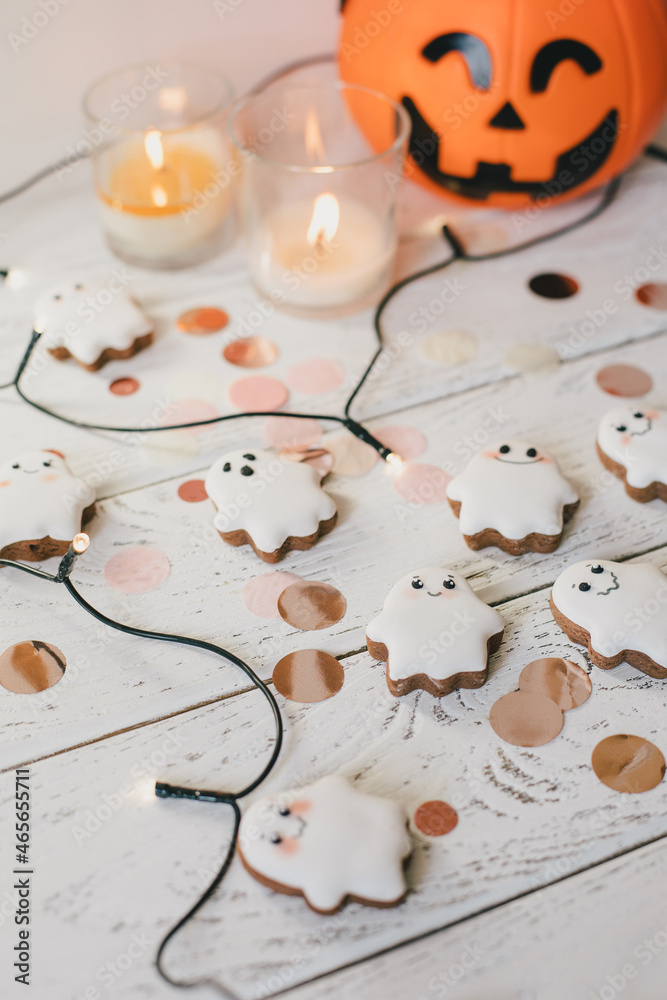 Funny scary Halloween ghost cookies on white wooden background. Funny scary Halloween ghost cookies on white wooden background.