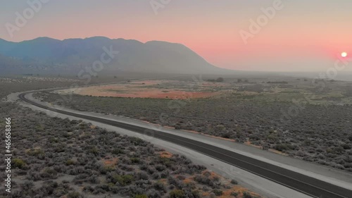 Aerial: Desert highway and the Black Rock Desert, home of the Burning Man Festival, Gerlach, Nevada, USA photo