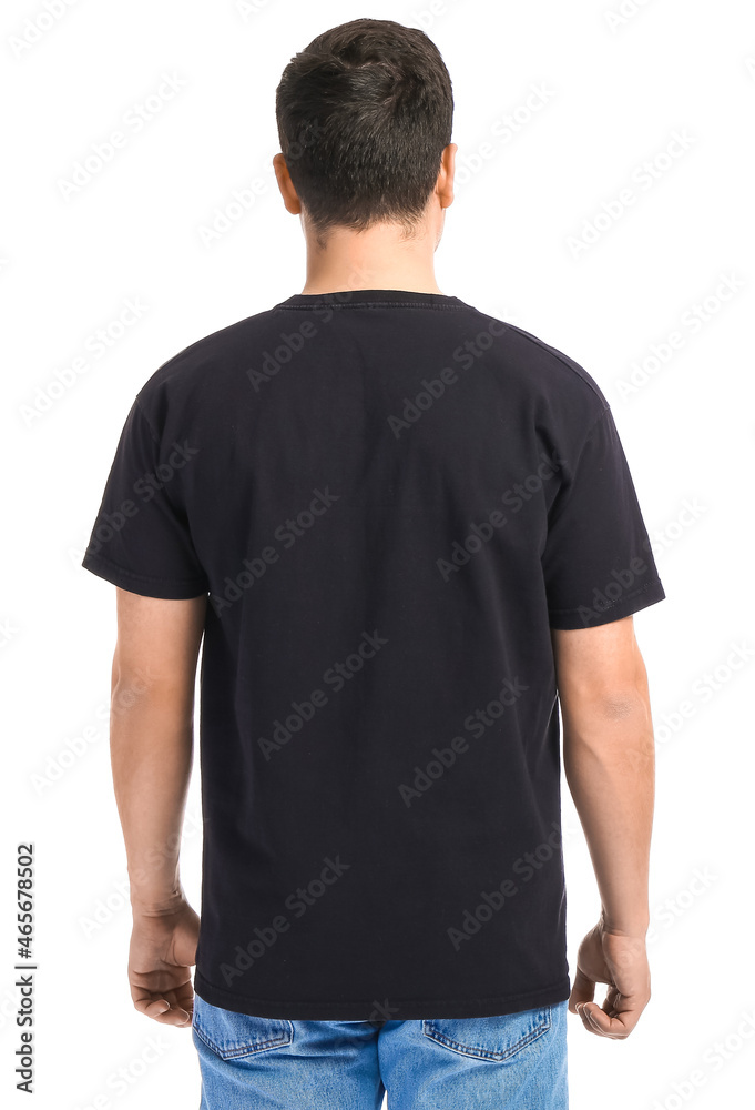 Fototapeta premium Handsome young man in stylish t-shirt on white background, back view