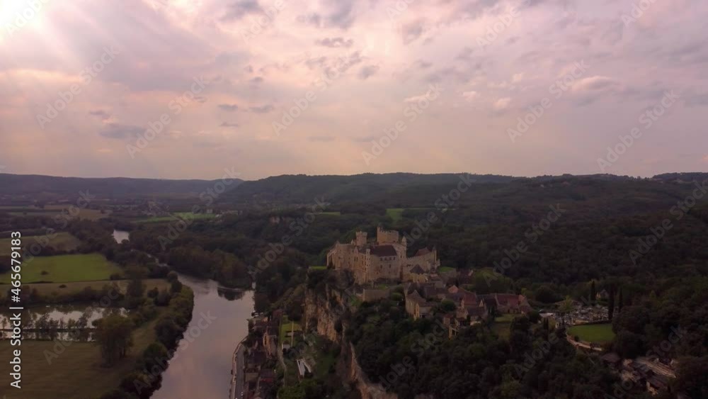 Aerial medieval castle Sunset dramatic view of Beynac-et-Cazenac in France near the dordogne river, Aerial medieval castle Sunset dramatic view of Beynac-et-Cazenac in France near the dordogne river,