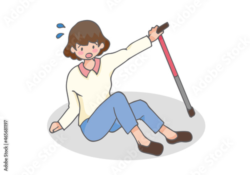 尻もちをついて転倒する女性