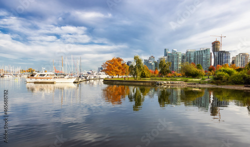 Stanley Park in Coal Harbour, Downtown Vancouver, British Columbia, Canada. Fall Season Colors. Marina in Urban Modern City.