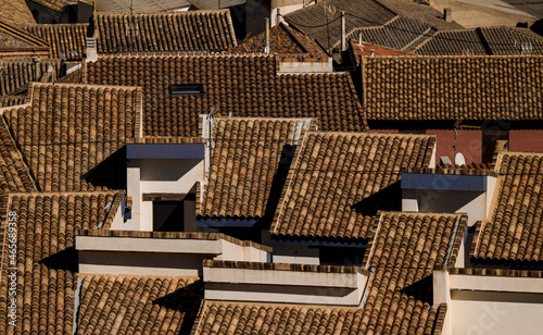 Aerial view of rooftops of small town, Consuegra, Castilla la Mancha, Spain