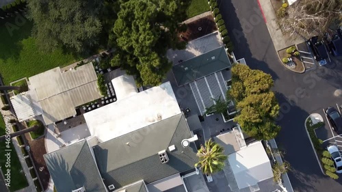 Top view forward of roofs of a wedding location in St. Benicia, California. Slow motion photo