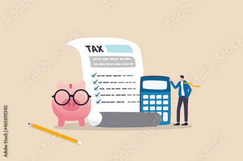 Income tax filing, calculate revenue and filling tax form, expert complete checklist for all reduction, refund and payment concept, expertise businessman completed tax filing form with calculator. photo