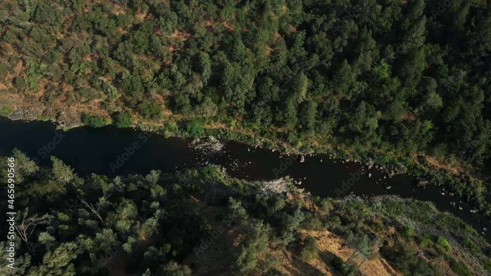 Drone Descending Over North Fork American River In Lush Forest Of Sierra Nevada In Northern California USA. Aerial Drone Descending Over North Fork American River In Lush Forest Of Sierra Nevada In Northern California USA. Aerial