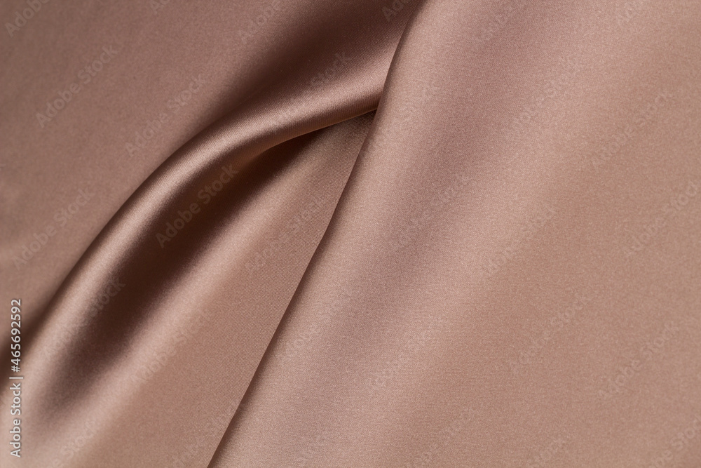 Fototapeta premium Texture of the fabric swirling in a whirlpool. cloth background. Web article template. Long header banner format. Sale coupon. Visit card. Your information. Text space.