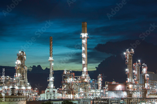 Oil​ refinery ​ and​ plant tower column refinery of petrochemistry industry in oil​ and​ gas​ ​industry with​ cloud​ blue​ ​sky cloud the twilight.