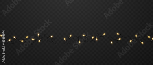 Abstract decoration of christmas string lights on black background.
