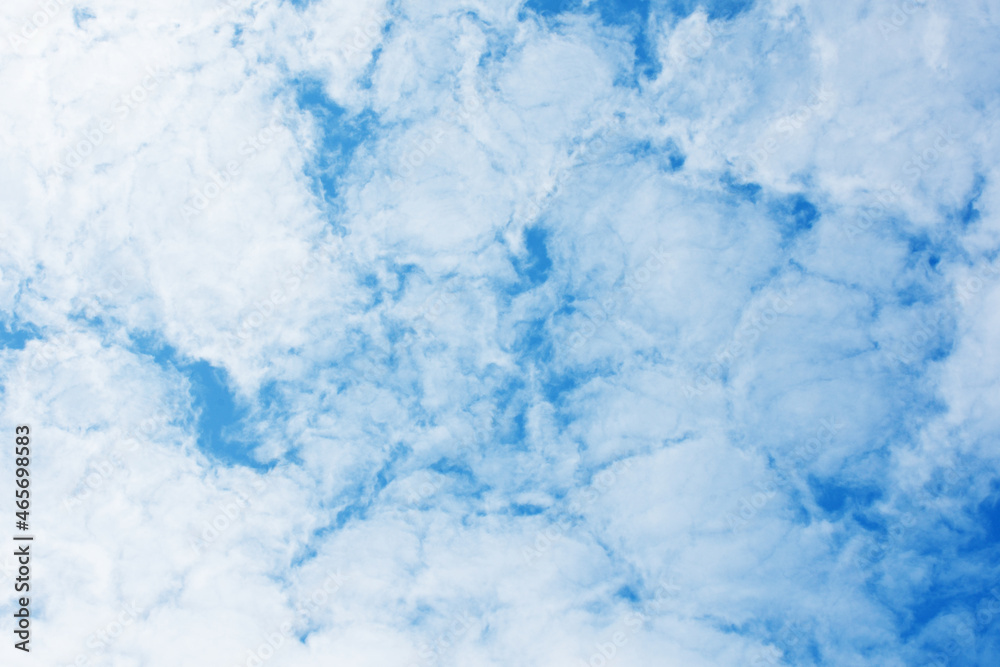 Blue sky scenery with white fluffy clouds for the background.