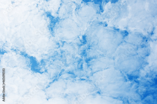 Blue sky scenery with white fluffy clouds for the background.