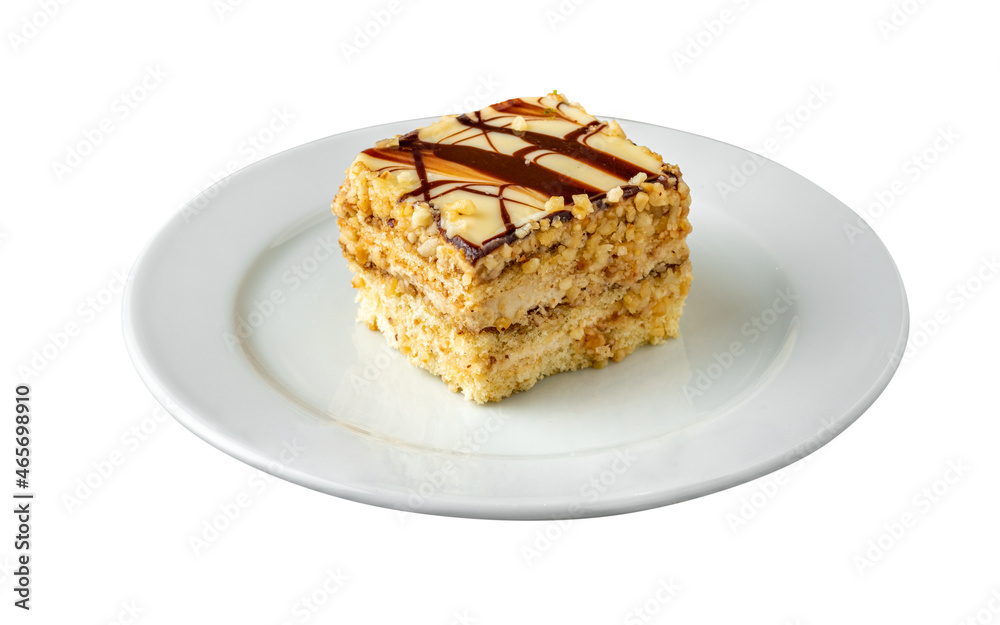 White chocolate and hazelnut cake on white background White chocolate and hazelnut cake on white background