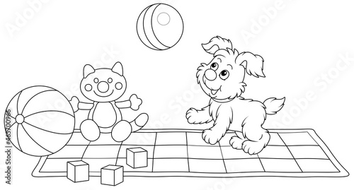 Happy little puppy gamboling and playing a striped ball among toys on a checked carpet in a nursery room, black and white outline vector cartoon illustration for a coloring book page