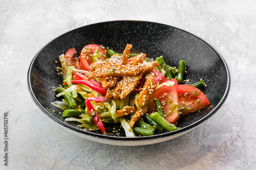 Salad with chicken and teriyaki sauce