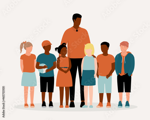 Portrait Of A Young Black Male Teacher Standing Together With A Diverse Group Of Elementary Students.