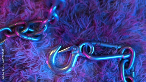 steel chain with hook in neon light