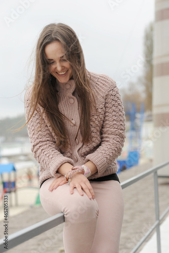 Cute young joyful woman autumn outdoor fashion