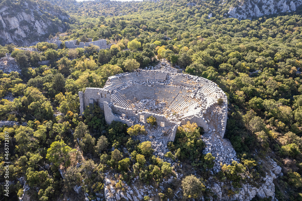 Obraz premium Termessos ancient city the amphitheatre. Termessos is one of Antalya -Turkey's most outstanding archaeological sites. Despite the long siege, Alexander the Great could not capture the ancient city.