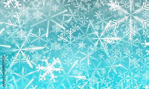 Various beautiful white snowflakes on a cyan background