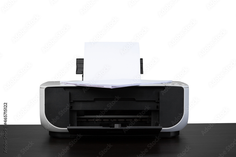 Laser home printer on table against white backgorund Laser home printer on table against white backgorund