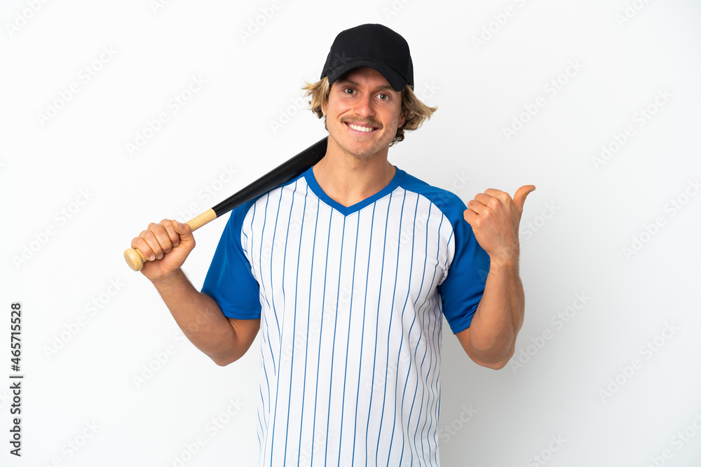 Young blonde man playing baseball isolated on white background pointing to the side to present a product Young blonde man playing baseball isolated on white background pointing to the side to present a product