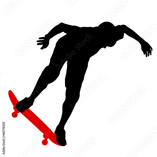 Black silhouette of an athlete skateboarder in a jump